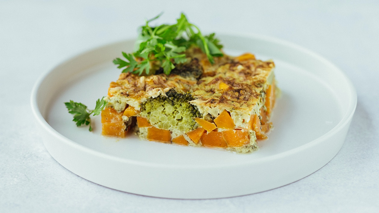Gratin van zoete aardappel met broccoli en bloemkool